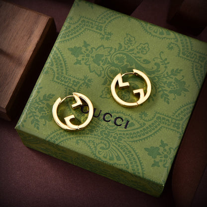 Boucles d'oreilles creuses Double G 18 carats