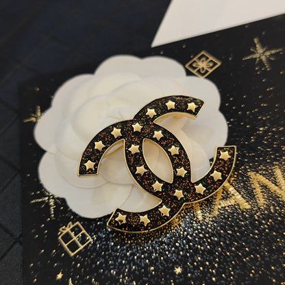 18K CC Black Star Brooch