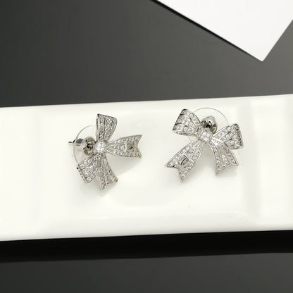 18K CC Bow Tie Diamond Earrings