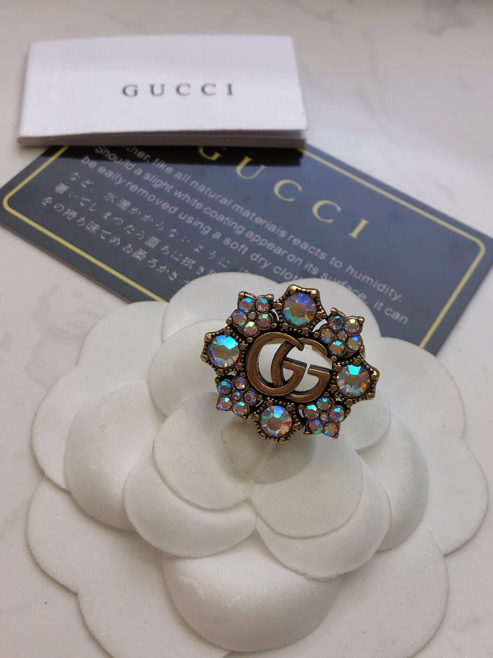 Bague fleur en cristal double G 18 carats