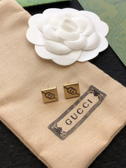 Boucles d'oreilles cube double G 18 carats