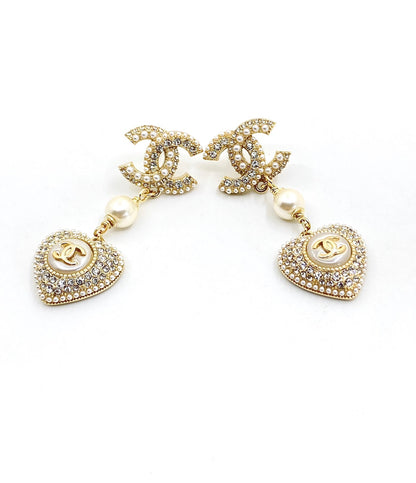 Boucles d'oreilles pendantes en forme de cœur CC 18 carats