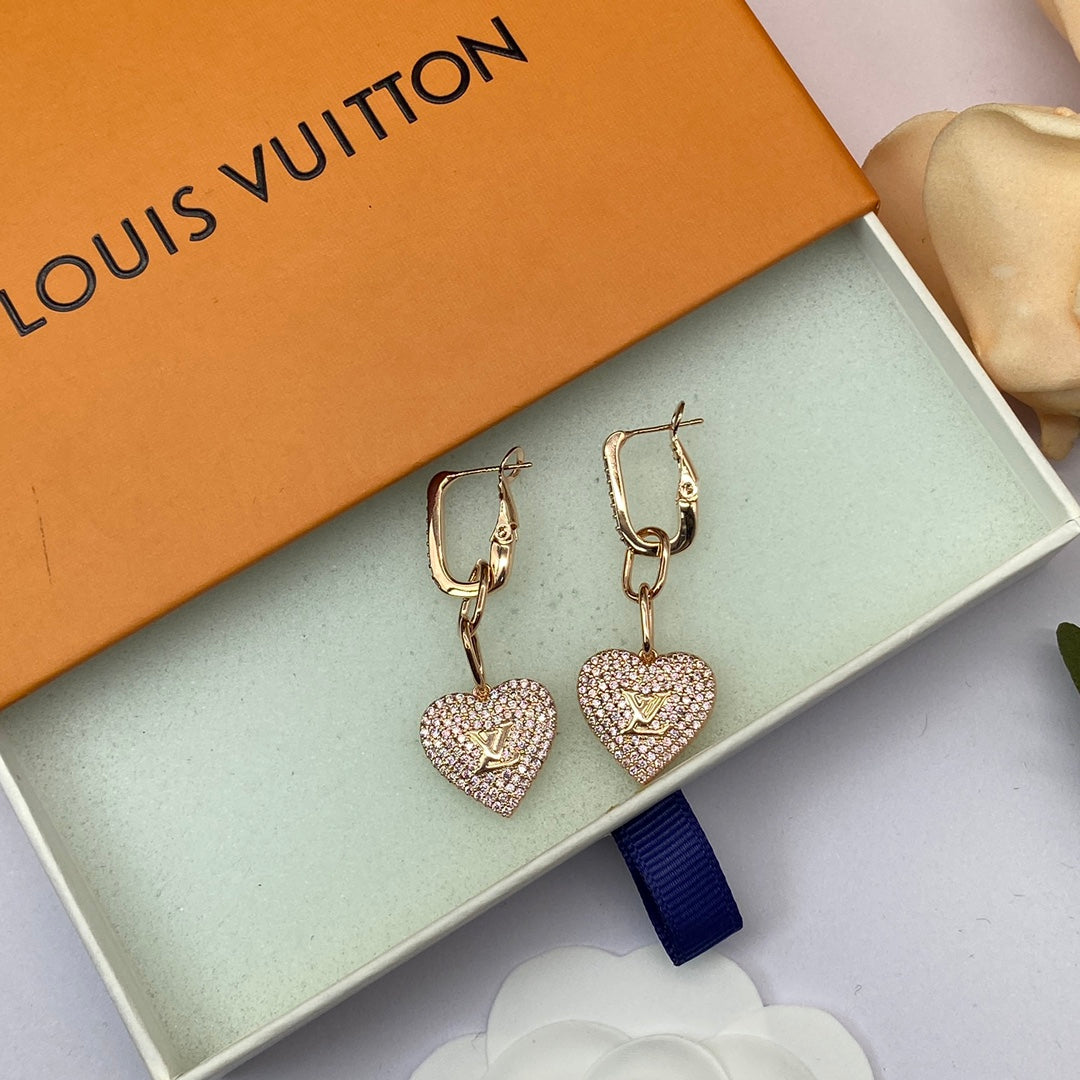 Boucles d'oreilles coeur en diamant Louis 18 carats