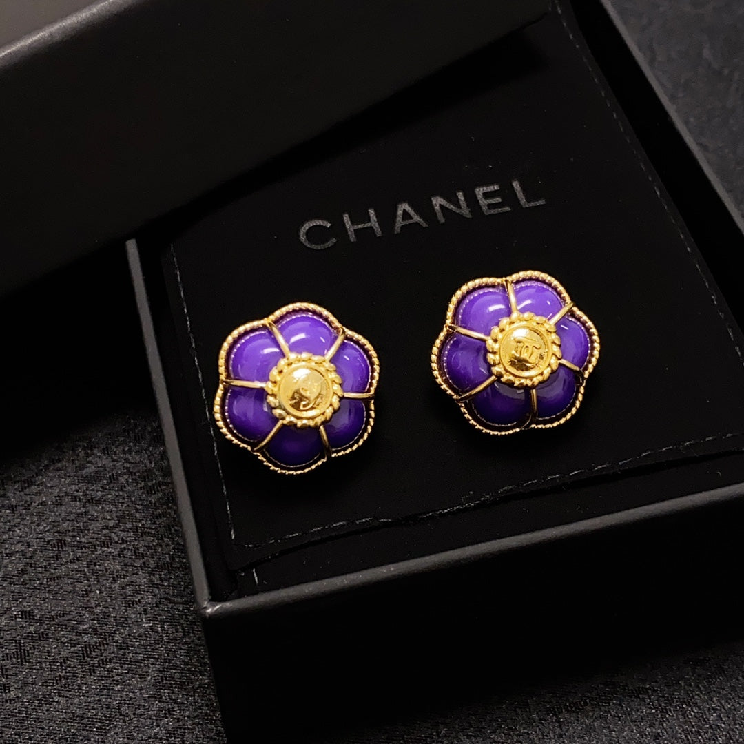 Boucles d'oreilles fleurs violettes 18 carats CC