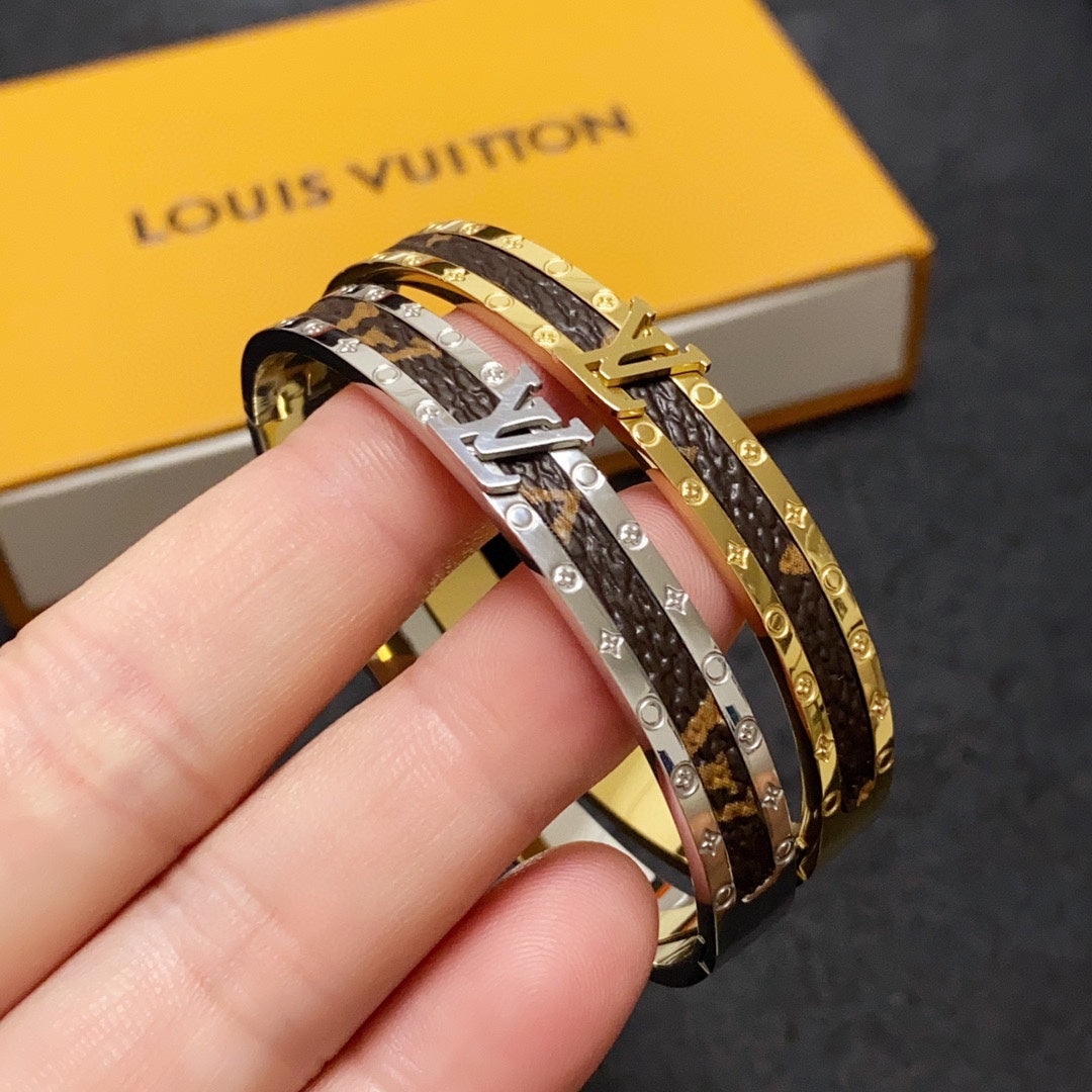 Bracelet vintage en cuir Louis 18 carats