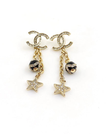 Boucles d'oreilles en perles étoiles CC 18 carats