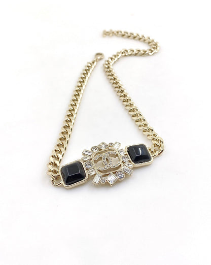 Collier chaîne avec cristaux noirs CC 18 carats