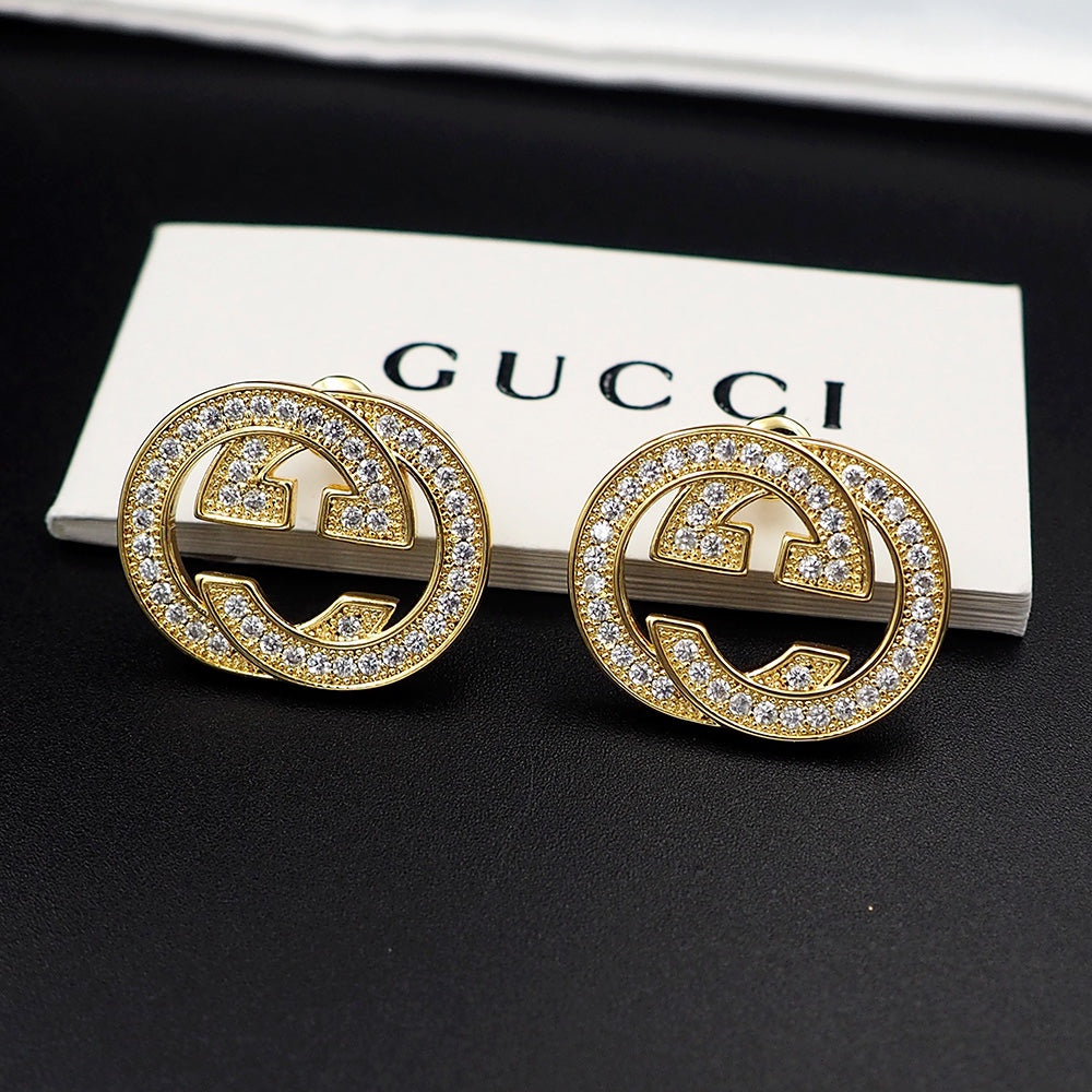 Boucles d'oreilles diamants Double G 18 carats