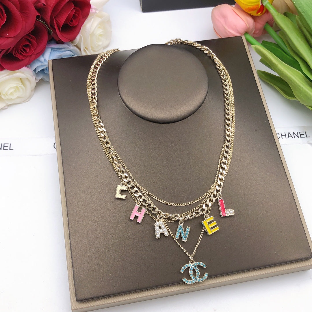 Collier typo couleur CC 18 carats