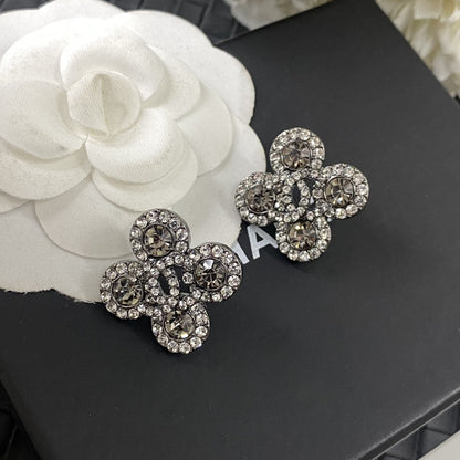 Boucles d'oreilles en cristaux de fleurs CC 18 carats