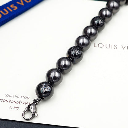 Bracelet de perles monogramme Louis 18 carats