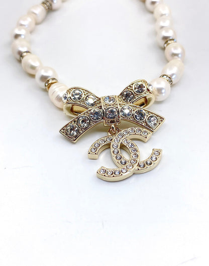 Collier diamants nœud papillon CC 18 carats