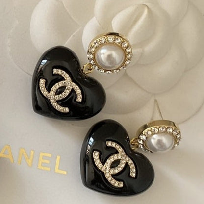 Boucles d'oreilles coeur noir 18 carats CC