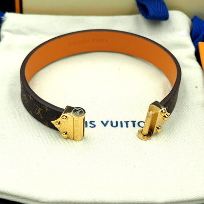 Bracelet vintage en cuir Louis 18 carats