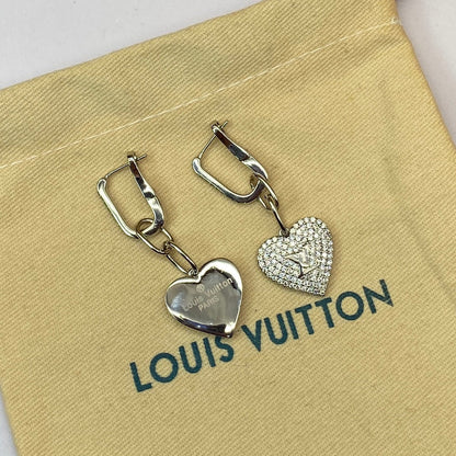 Boucles d'oreilles coeur en diamant Louis 18 carats