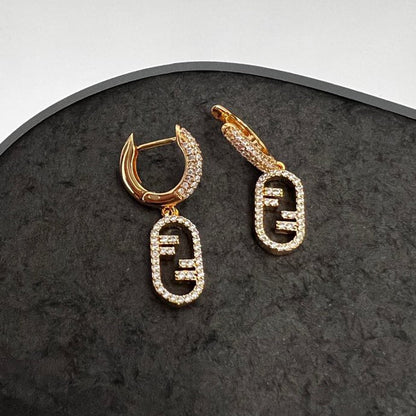 Boucles d'oreilles F O'Lock 18 carats