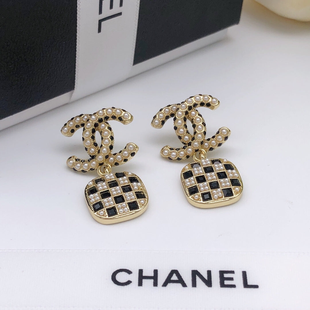 Boucles d'oreilles chaîne CC 18 carats