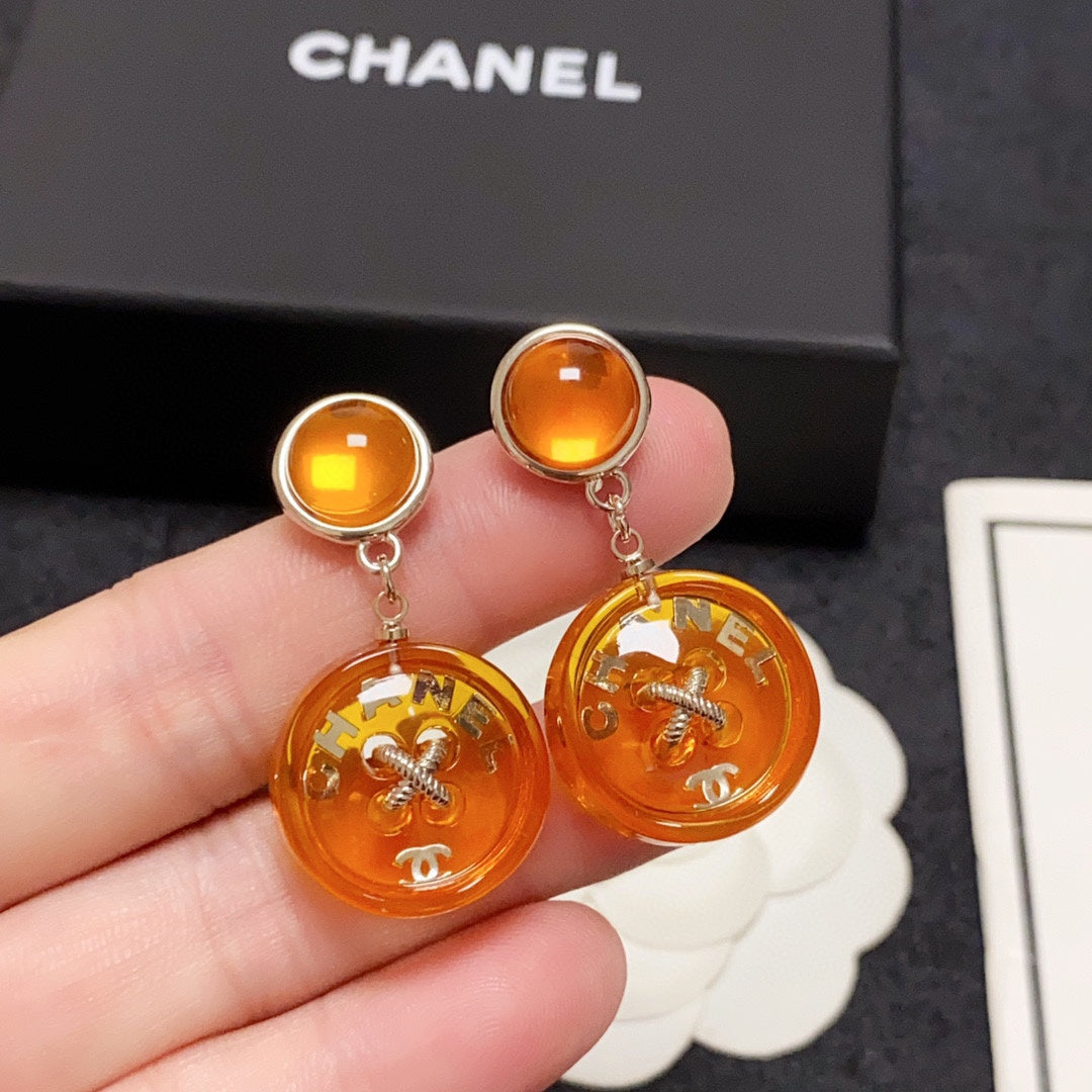 Boucles d'oreilles pendantes orange CC 18 carats