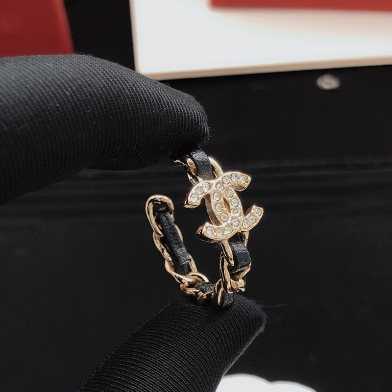 CC Black Leather Gold Earrings