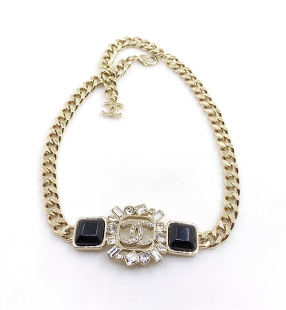 Collier chaîne avec cristaux noirs CC 18 carats