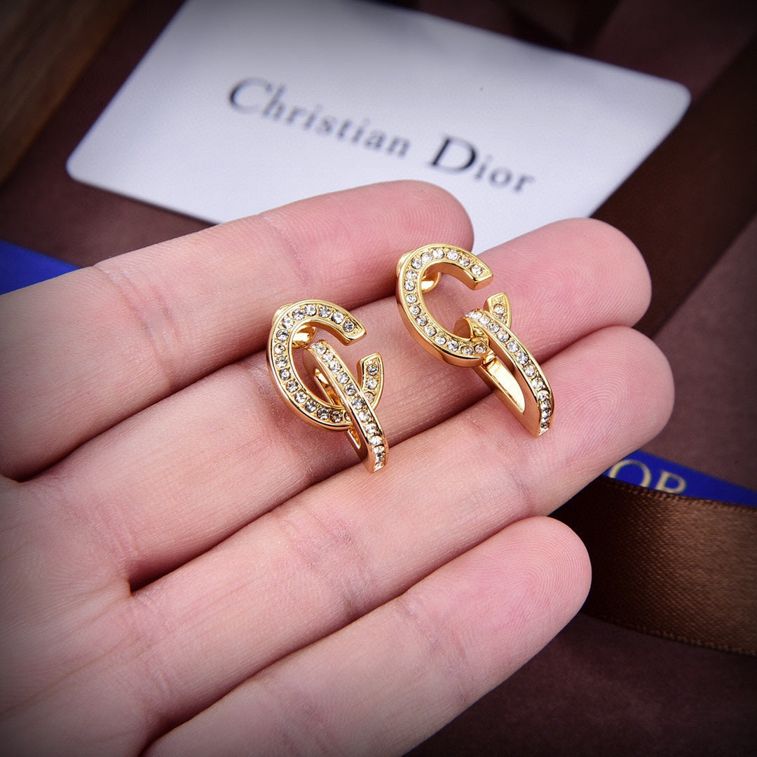 Boucles d'oreilles cadenas CD 18 carats