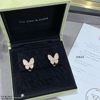 Boucles d'oreilles deux diamants papillon 18 carats