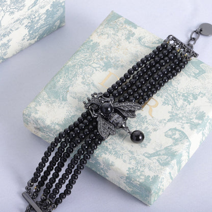 Bracelet de perles noires CD Bee 18K