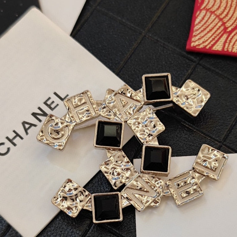 18K CC Black Crystals Brooch