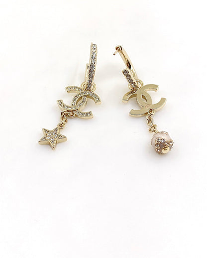 Boucles d'oreilles pendantes perles étoiles CC 18 carats