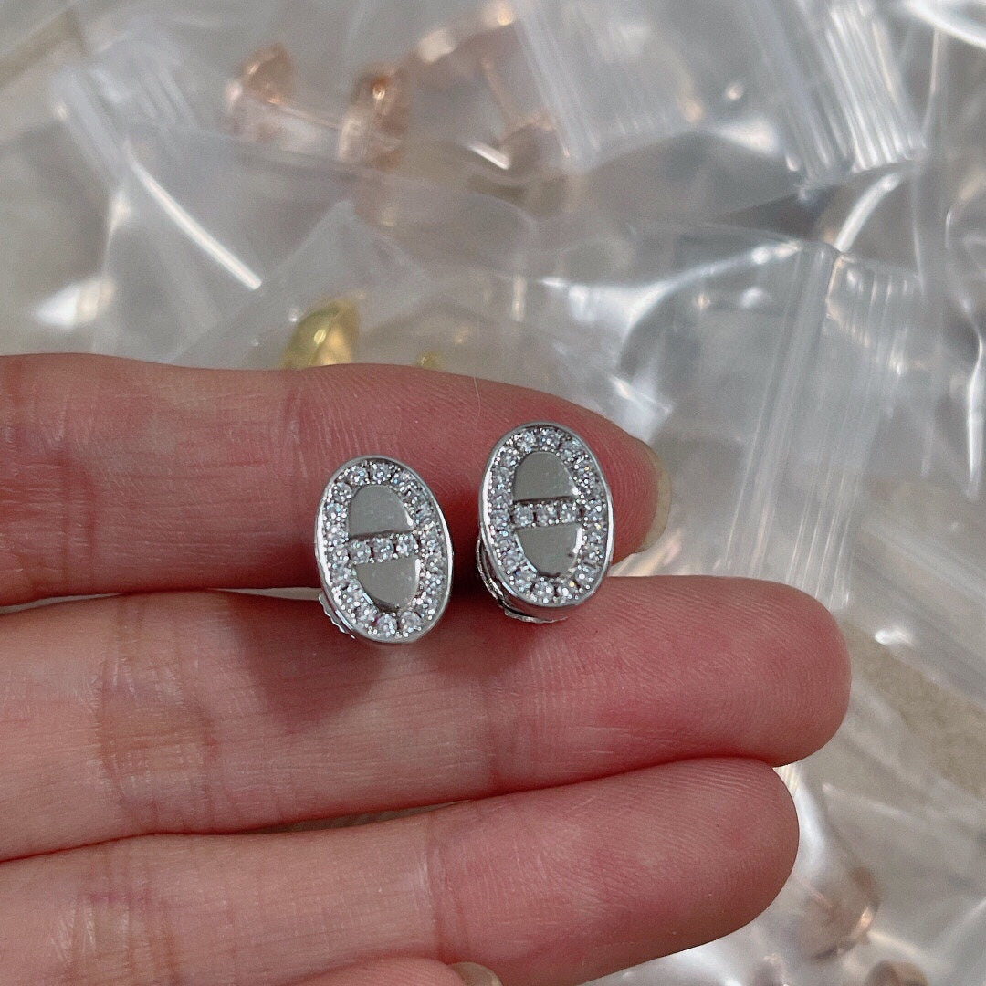 Boucles d'oreilles H en diamants mini farandole 18 carats