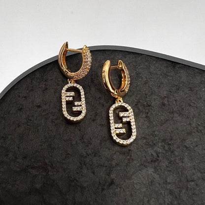 Boucles d'oreilles F O'Lock 18 carats