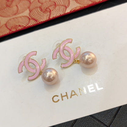 Boucles d'oreilles perles roses 18 carats CC