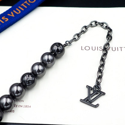 Bracelet de perles monogramme Louis 18 carats