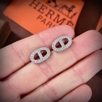 Boucles d'oreilles Farandole H en diamant 18 carats