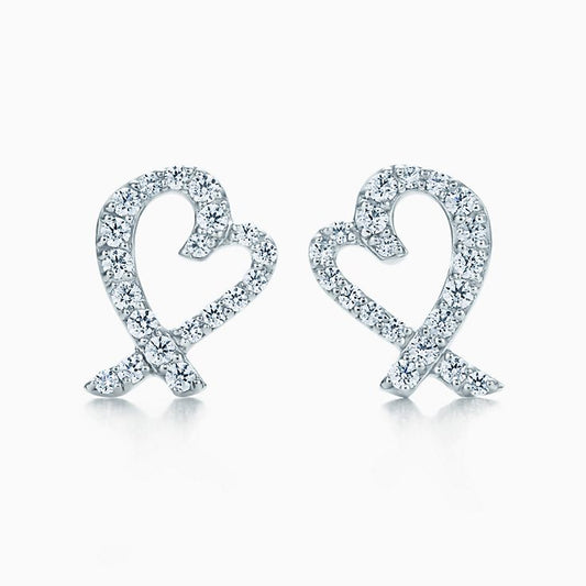 Boucles d'oreilles diamant T 18 carats